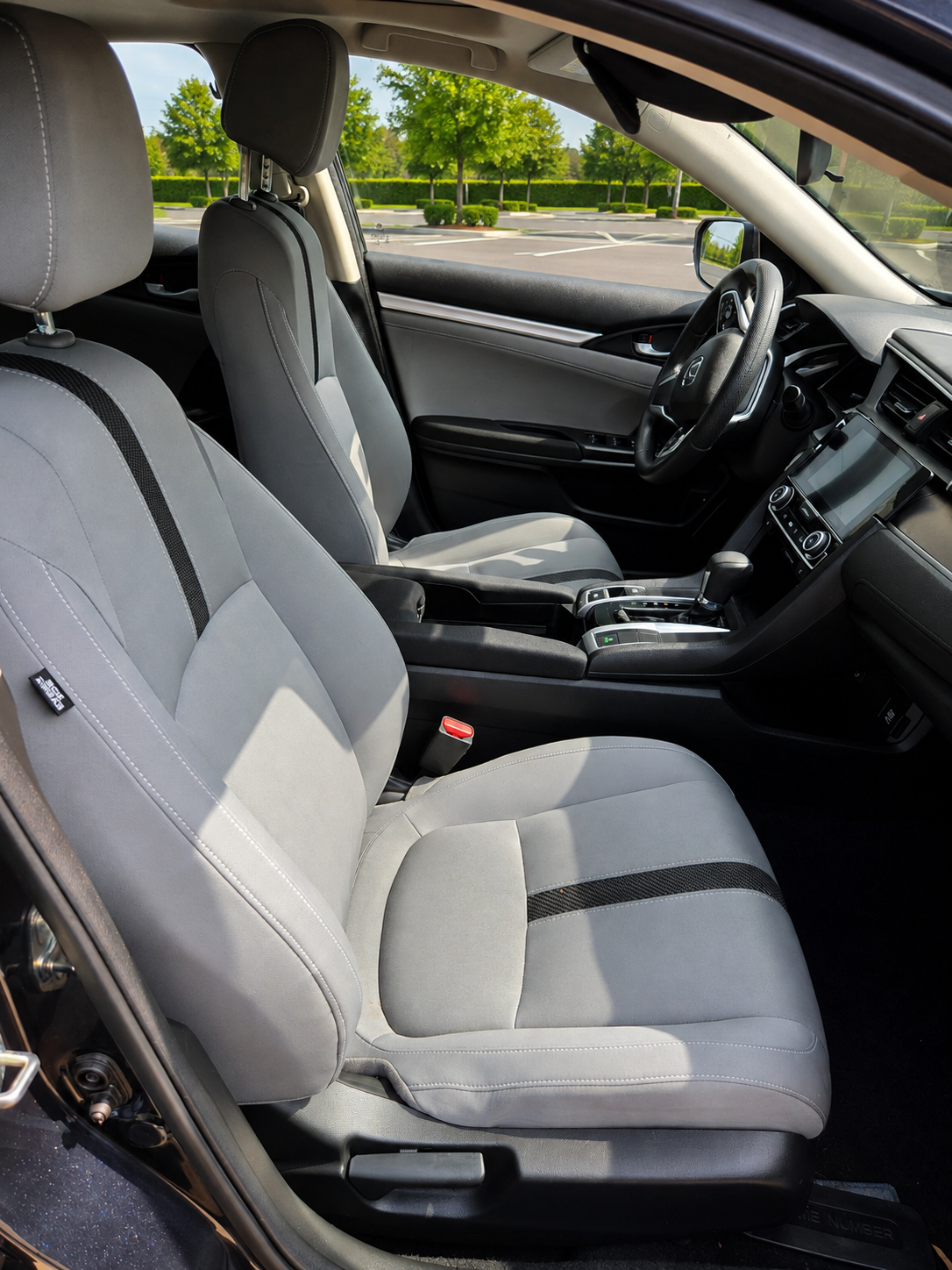 Front seats and dashboard interior of the 2016 Honda Civic Sedan